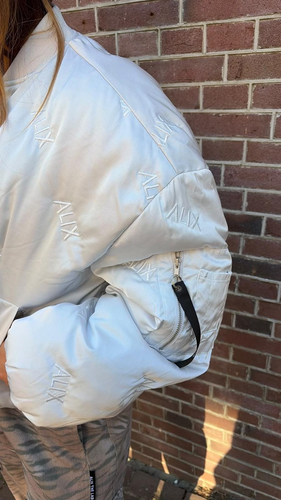 LADIES WOVEN LOGO QUILTED JACKET